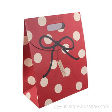 Printed spotty bowknot gift packaging paper bag